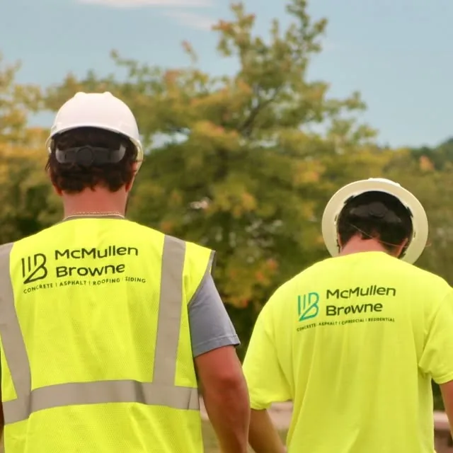 McMullen Browne team members in high-visibility clothing at the Detroit River wildlife refuge site